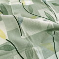 Obliečky s naturálnym motívom vejúcich listov v zelenej farbe zo 100% bavlny.