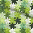 Predĺžené posteľné obliečky s potlačou zaujímavého motívu v tvare puzzle v zelenej farbe zo 100% bavlny.