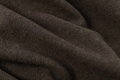 Hrejivá merino deka 140 x 200 cm z 80 % merino vlny a 20 % nylonu. Mäkká, priedušná a príjemná deka so strapcami pre pohodlný oddych doma. Tmavo hnedá merino deka.