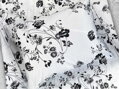 Obliečky s kvetovaným motívom v čiernej farbe na bielom podklade zo 100% bavlny.