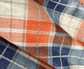 Flanelové obliečky GLASKOW TERRA s potlačou farebného kára v oranžovo modrých tónoch.