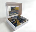 Makosaténové obliečky s potlačou zlatistých palmových listov v zlatej farbe v darčekovej krabičke.