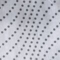 Kvalitná bavlnená textília s farebnou potlačou v kvalite flanel v bielej farbe so sivými bodkami.