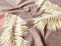 Bavlnené obliečky s motívom béžových a oranžových listov paprade na hnedom podklade.