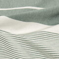 Bavlnená plážová osuška v praktickej taštičke zelenej farby.