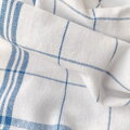 Kvalitná bavlnená utierka ANITA Modrá v bielo-modrom károvanom prevedení. 