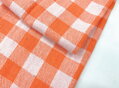 Kvalitná bavlnená utierka KARINA Orange v bielo-oranžovom károvanom prevedení zo 100% bavlny.