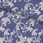 Posteľné obliečky s bielym ornamentom na modrom podklade zo 100% bavlny.