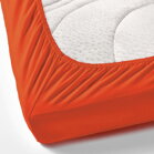 Napínacie Jersey prestieradlo v sýtej oranžovej farbe, príjemne hebké a citlivé k pokožke, vhodná aj na vysoký matrac.